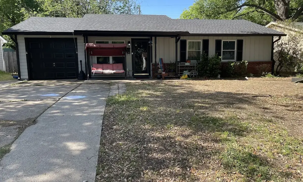 Asphalt Shingle Roof Repair crew at work on a residential roof in Tullahoma